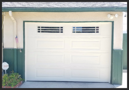 New long panel sectional door in Almond with L-699 windows